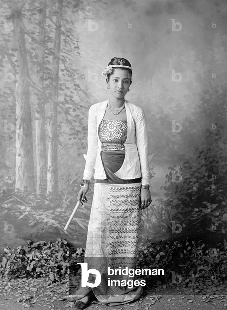 Burma / Myanmar: Studio portrait of a young Burman woman with a cheroot, probably Rangoon / Yangon, 1895
