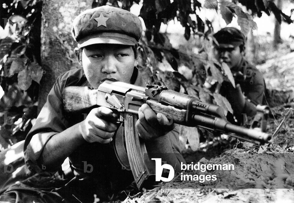 Burma / Myanmar: CPB soldier with gun, Communist Party of Burma (CPB), (c. 1985)