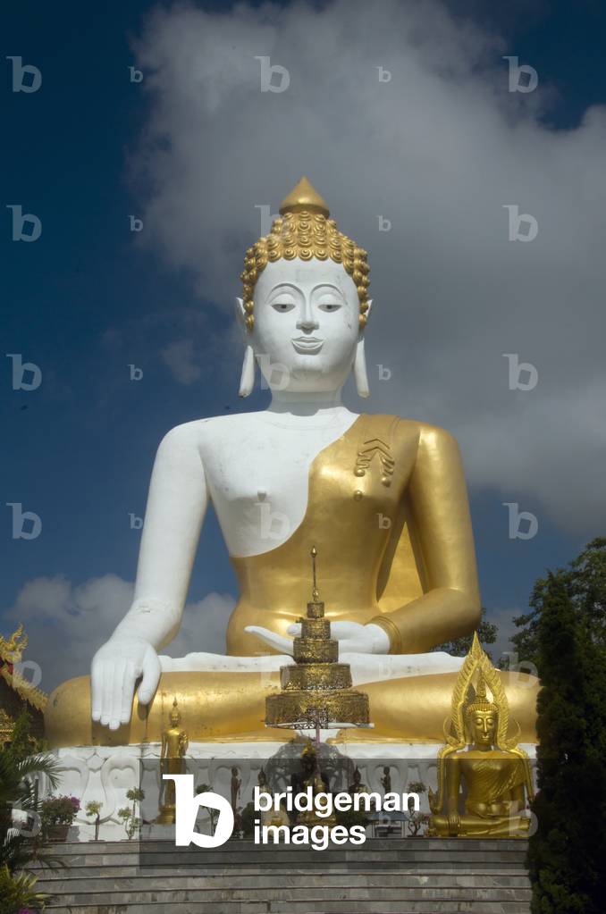 Thailand: Giant Buddha statue overlooking the Chiang Mai valley, Wat Phrathat Doi Kham, Chiang Mai