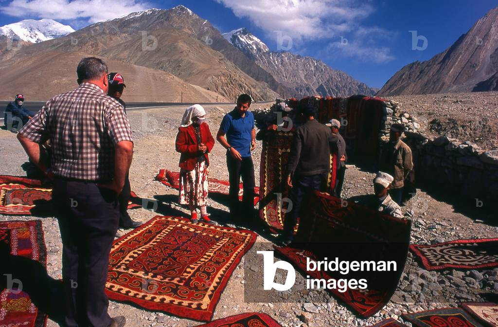 China: Kirghiz carpet traders, Karakoram Highway, Xinjiang