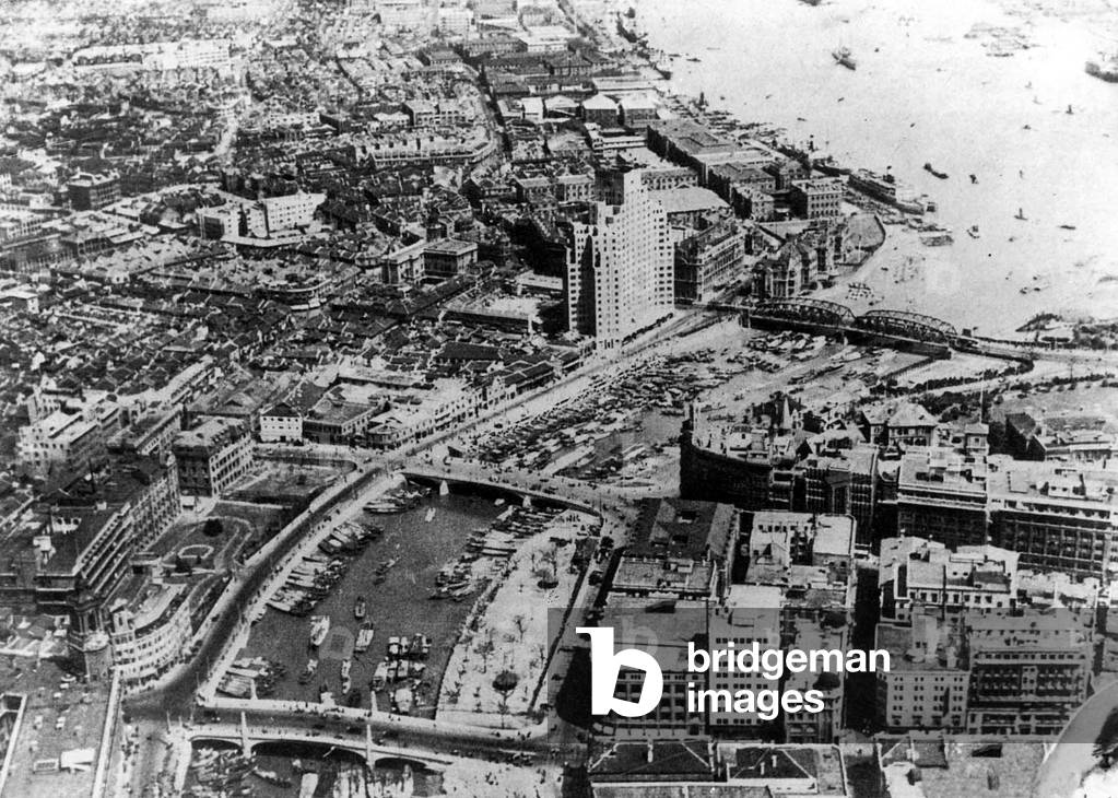 China: Shanghai - Suzhou Creek and the Huangpu River from the air, c.1935.