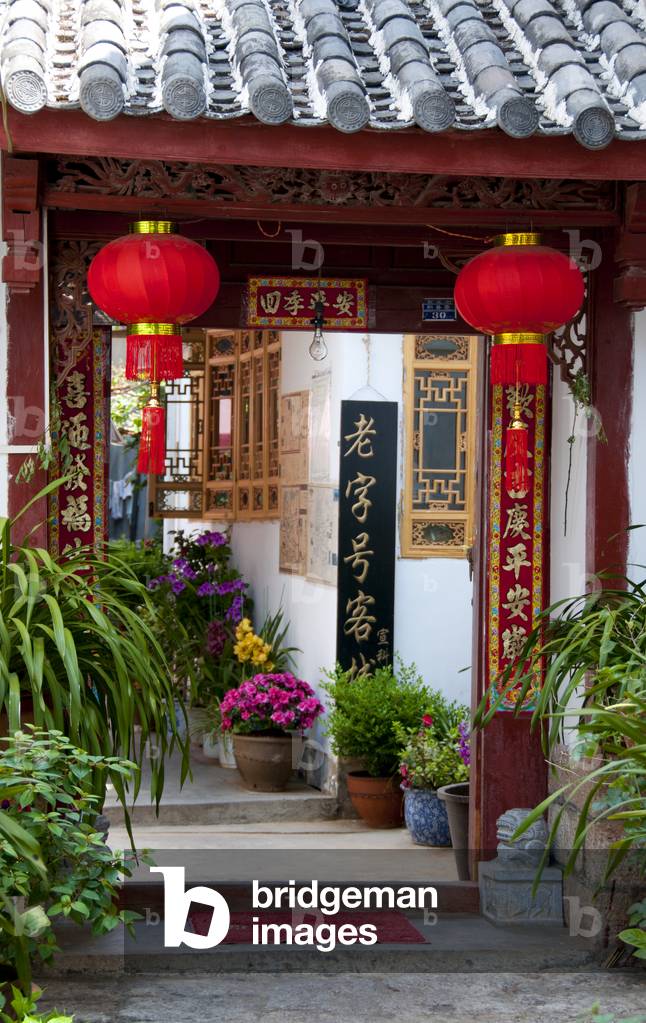 China: Naxi house entrance, Lijiang Old Town, Yunnan Province