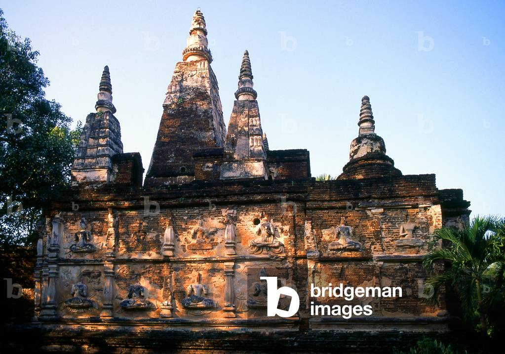Thailand: Stucco thewada (angels) adorn the Maha Chedi (Great Chedi), Wat Chet Yot (Seven Spires), Chiang Mai, northern Thailand