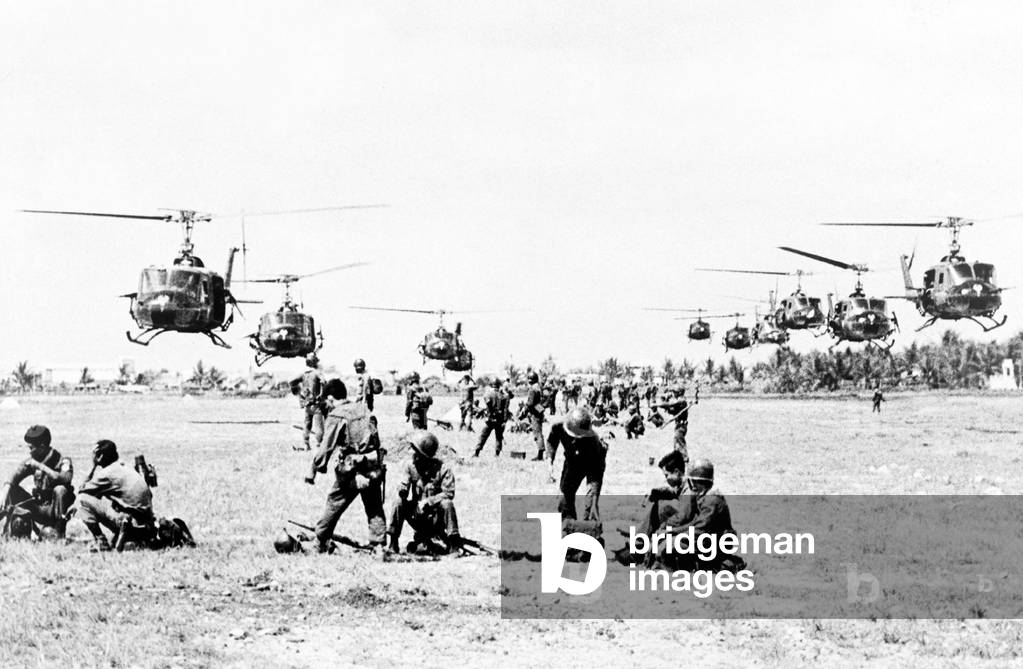 Vietnam: U.S. helicopters arriving to air lift Vietnamese government Rangers of the 43rd battalion into battle against NLF (Viet Cong) guerrillas, Saigon, 1965.