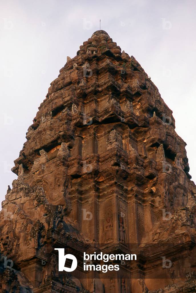Cambodia: Late evening light hits the main tower of the central sanctuary at Angkor Wat