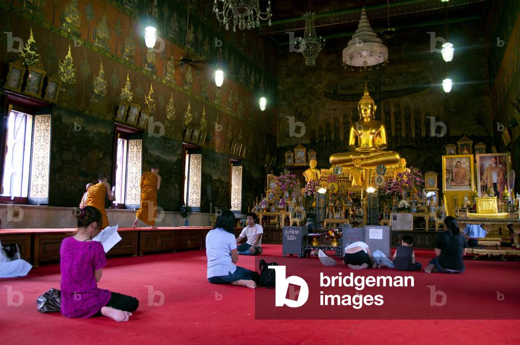Thailand: Devotees in the main viharn, Wat Rakhang, Bangkok