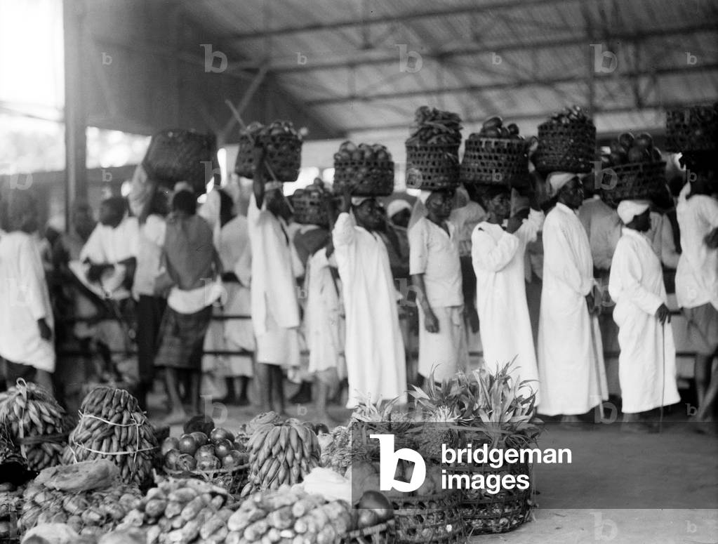 Tanzania / Zanzibar: Scene at a Stone Town fruit market, 1936