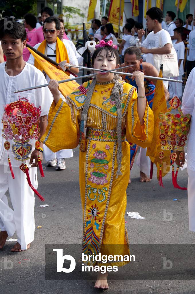Thailand: A female 'Ma Song' in the parade of devotees, Phuket Town, Phuket Vegetarian Festival