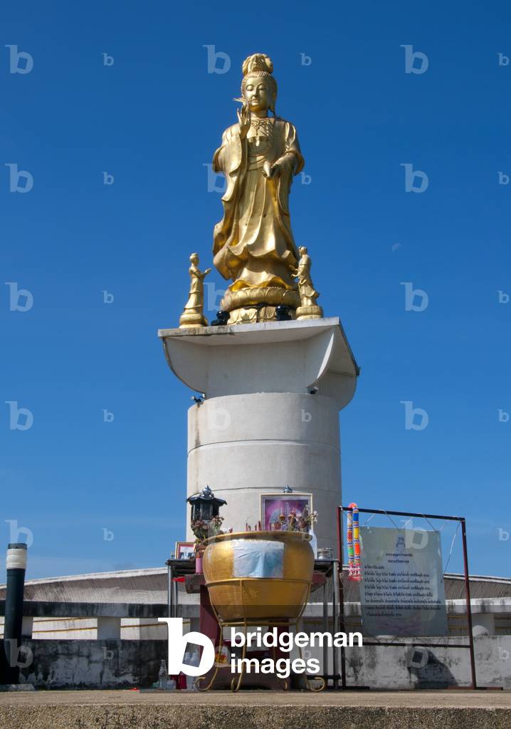 Thailand: The Goddess Kuan Yin overlooks the town above Wat Matchimaphum, Trang Town, Trang Province, southern Thailand