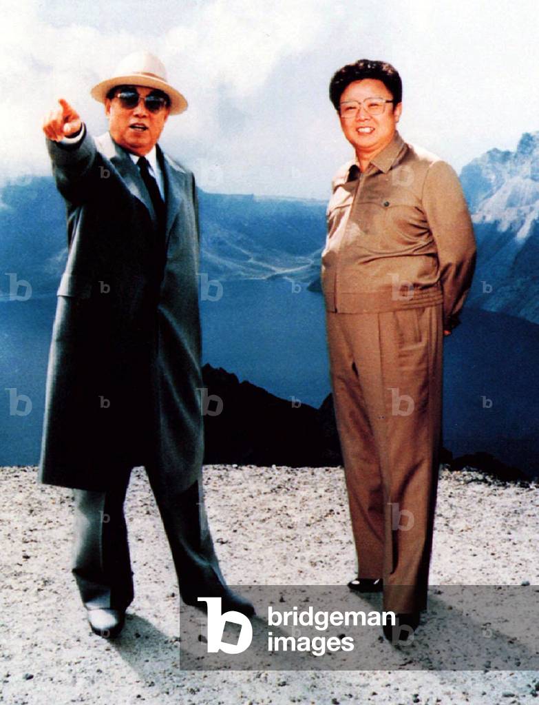 Korea: Propaganda photograph of North Korean leader Kim Il Sung together wth his heir and successor Kim Jong Il, c. 1985