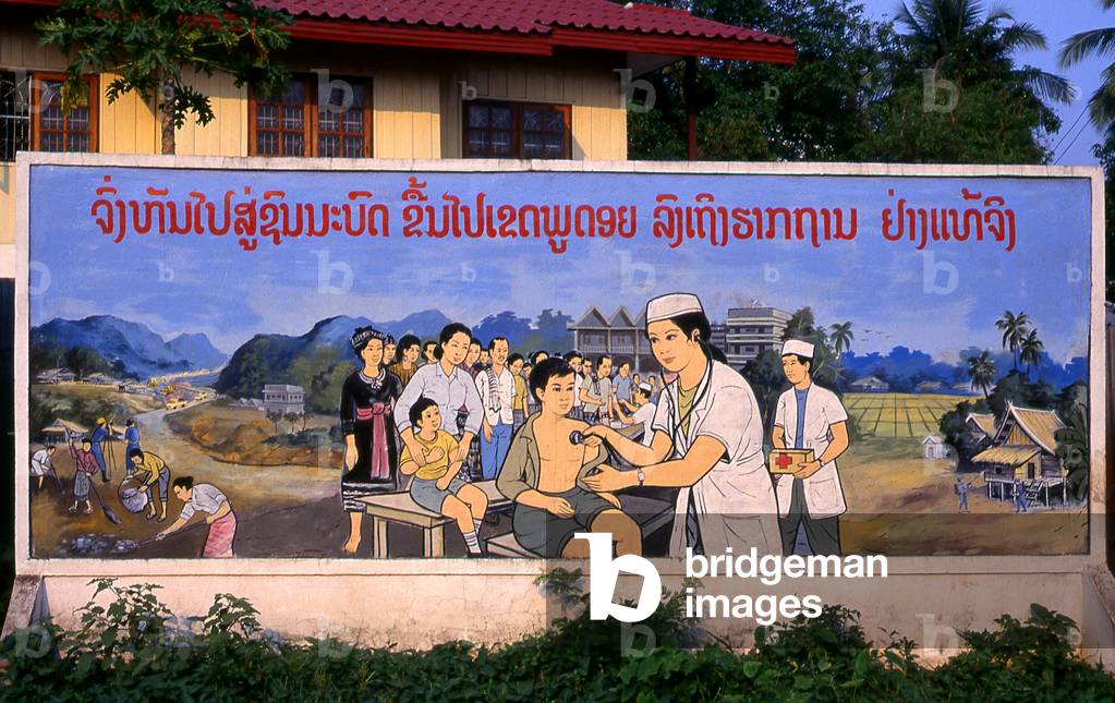 Laos: Health care, Revolutionary Socialist realist-style political poster on the streets of Vientiane
