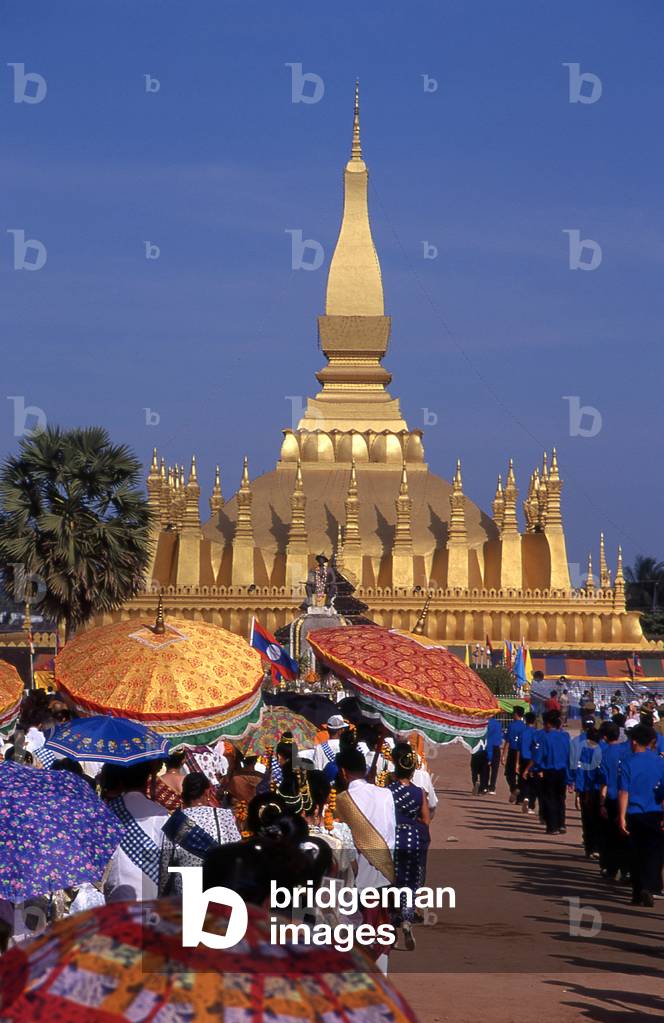 Laos:  The That Luang Festival parade nears That Luang, Vientiane