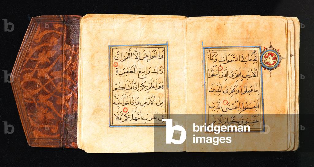 Middle East: two pages of a miniature Qur'an written in Rayhani and Thuluth scripts, c.1300.