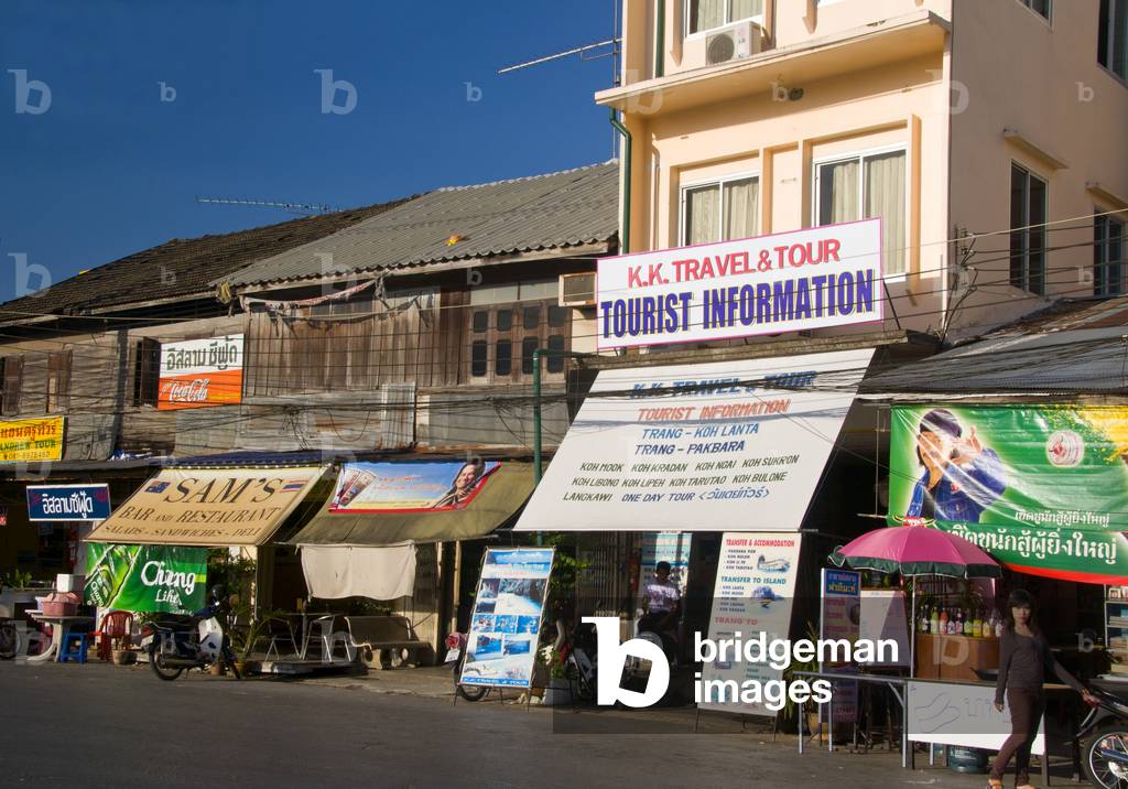 Thailand: Travel agents and restaurants in the old wooden shophouses near the railway station, Trang, Trang Province