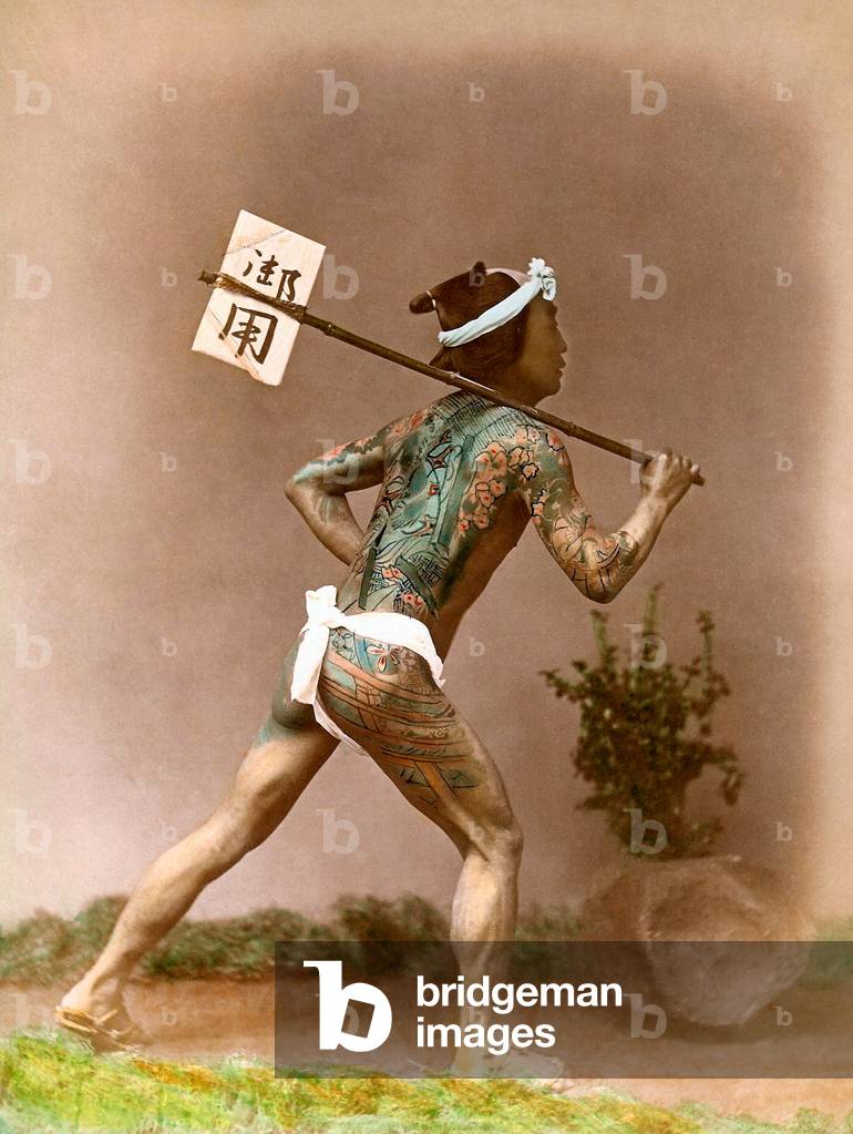 Japan: Tattooed Japanese mail runner or postman, late 19th century, c. 1890s