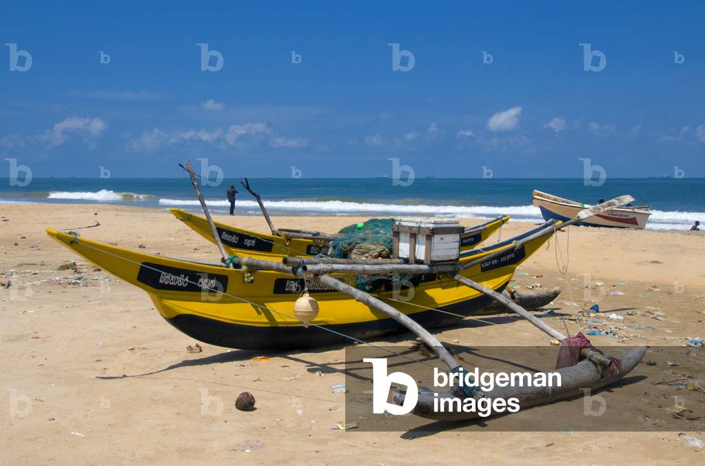 Sri Lanka: Traditional Sri Lankan fishing boats are now being made from fibreglass. Dehiwala was hit badly by the 2004 tsunami. Dehiwala, south of Colombo