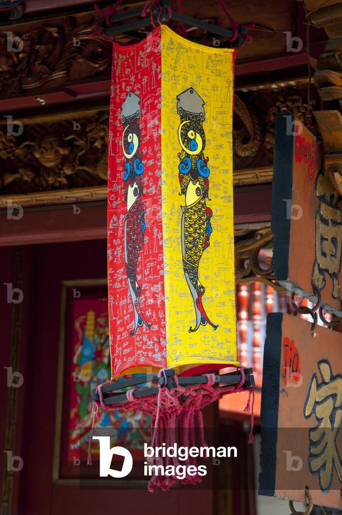China: Naxi lampshade outside the entrance to a guest house, Lijiang Old Town, Yunnan Province
