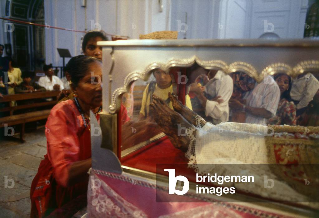 India: Pilgrims viewing the mummified body of St. Francis Xavier during the once a decade 'Exposition of St. Francis Xavier', Se Catedral de Santa Catarina (Se Cathedral), Goa (1994)