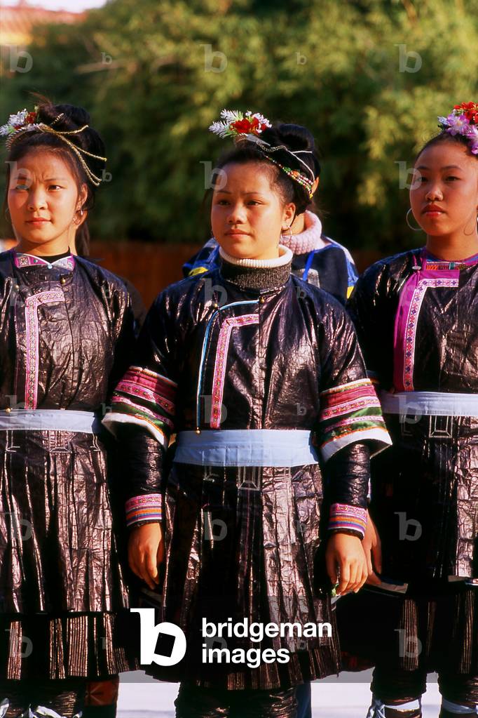 China: Young Dong women singing and dancing at the Guangxi Provincial Museum, Nanning, Guangxi Province