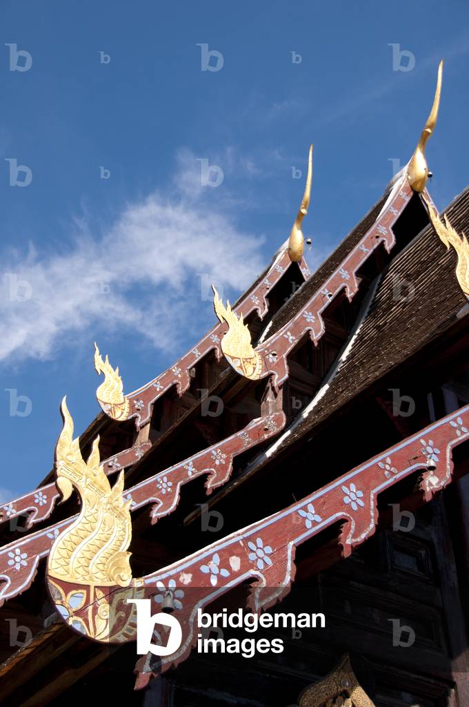 Thailand: The triple-tiered roof of the old wooden viharn, Wat Phan Tao, Chiang Mai