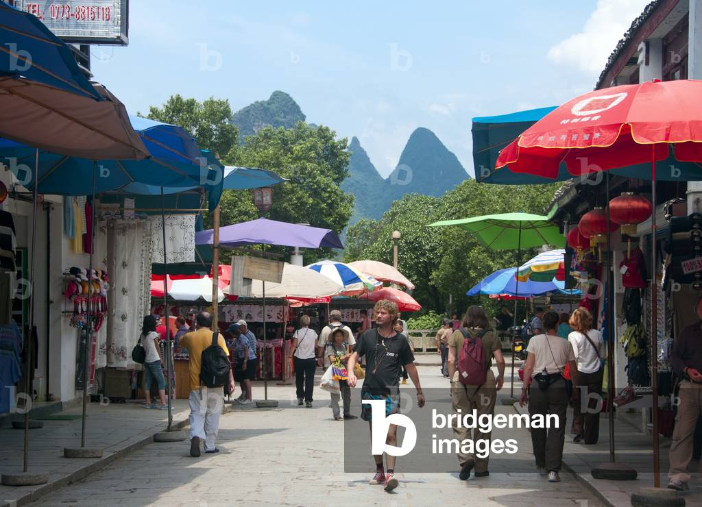 China: Tourists on Xi Jie ('Foreigner Street'), Yangshuo, near Guilin, Guangxi Province