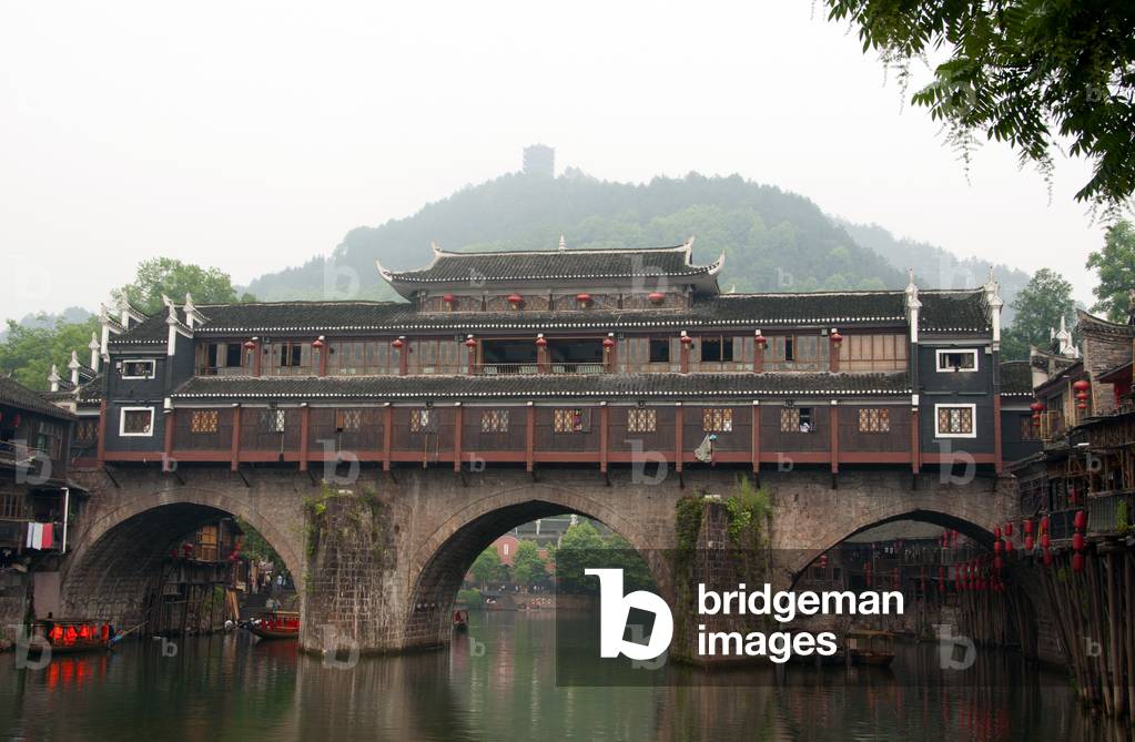 China: Mist hangs over Hong Qiao Bridge, Fenghuang's famed covered bridge