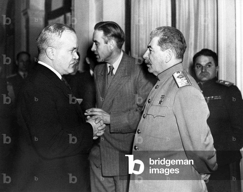 Russia / USSR: Vyacheslav Molotov (left) chats with Joseph Stalin (right), Averell Harriman, United States Ambassador to the Soviet Union 1943-1946 (centre) at the Yalta Conference, February 1945