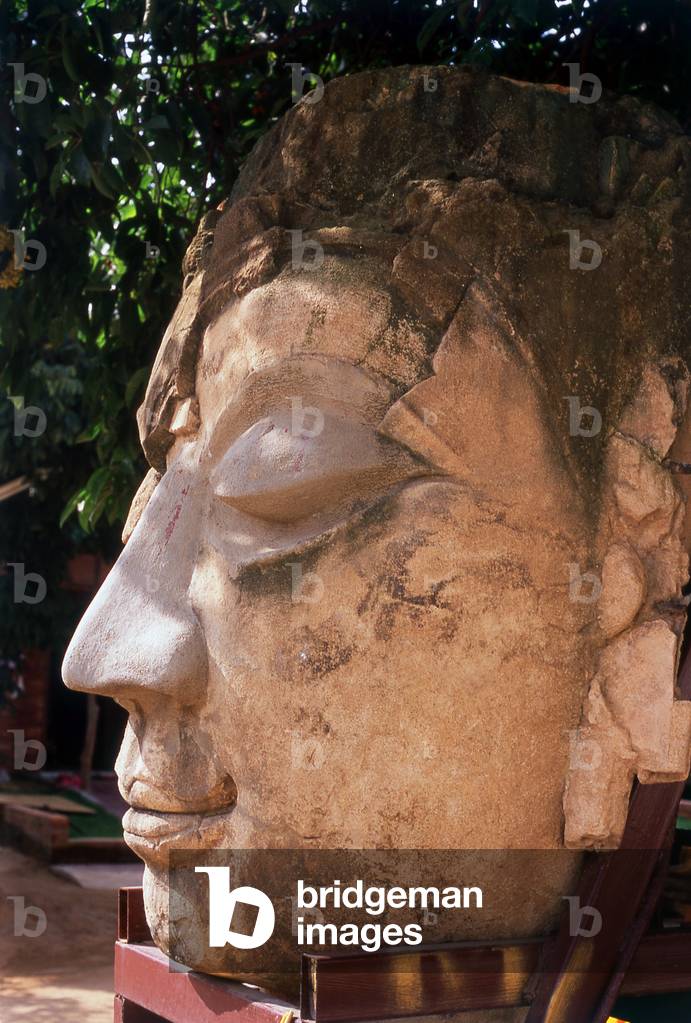 Thailand: Old Buddha head and altar set up for the Songkran (Thai New Year Water Festival) in the grounds of Wat Chetlin, Chiang Mai