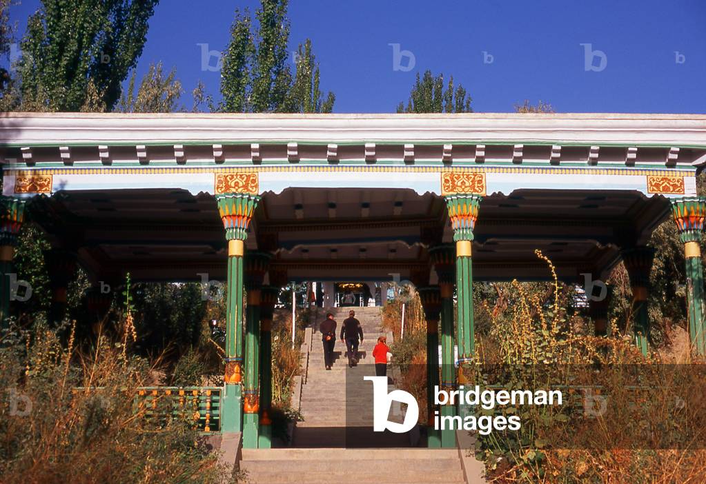 China: Entrance to the Mausoleum of Mahmud al-Kashgari (Mahmud al-Kashgari Mazar) who compiled the first Turkic languages dictionary, Upar, Xinjiang Province