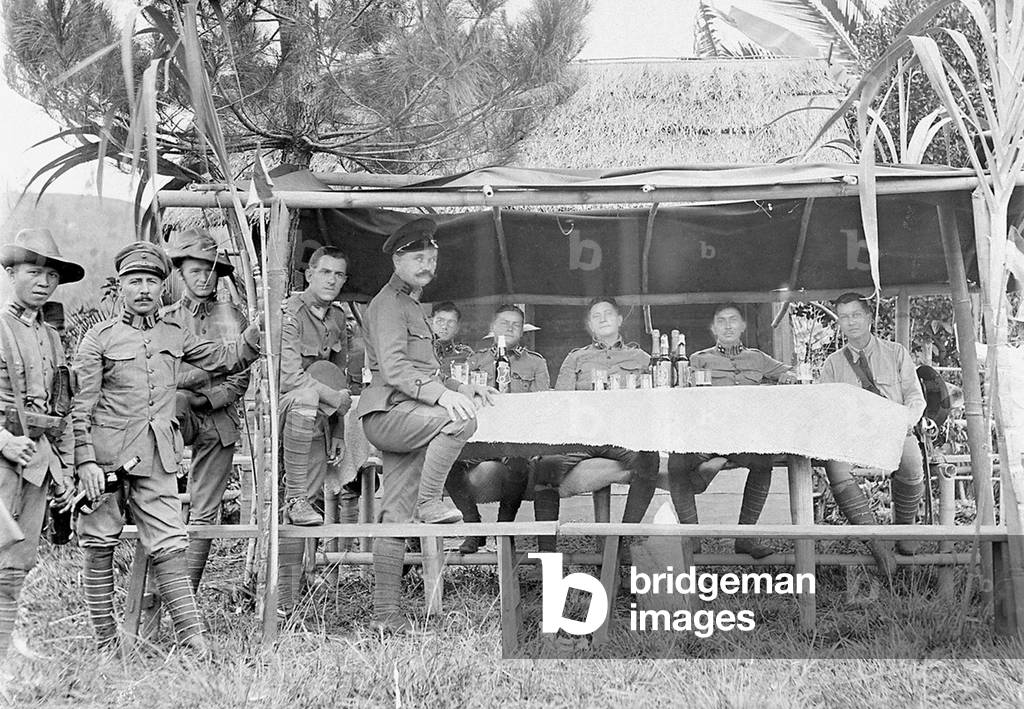 Indonesia / Netherlands: Dutch military officers and members of the military police celebrate the opening of a bridge at Blangkedjeren, Aceh, c. 1925