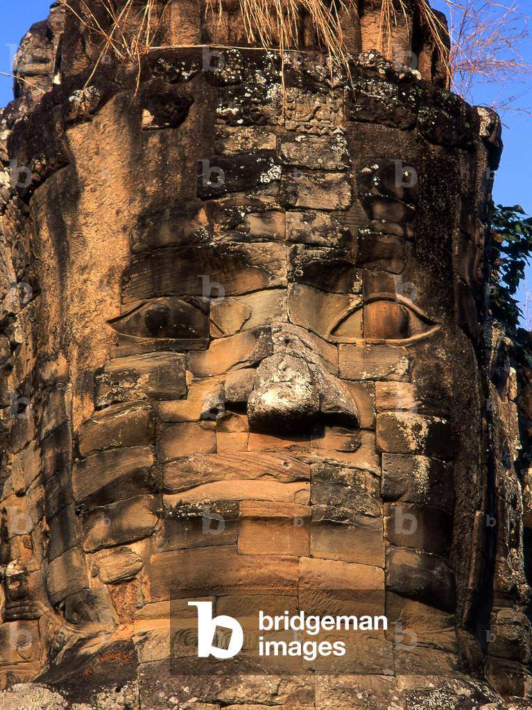 Cambodia: The face of Jayavarman VII on the South Gate, Angkor Thom