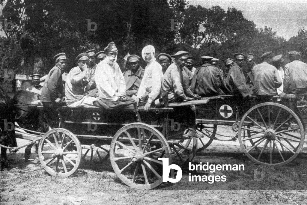 Russia: Injured Russian soldiers in Red Cross wagons, World War I, c. 1916