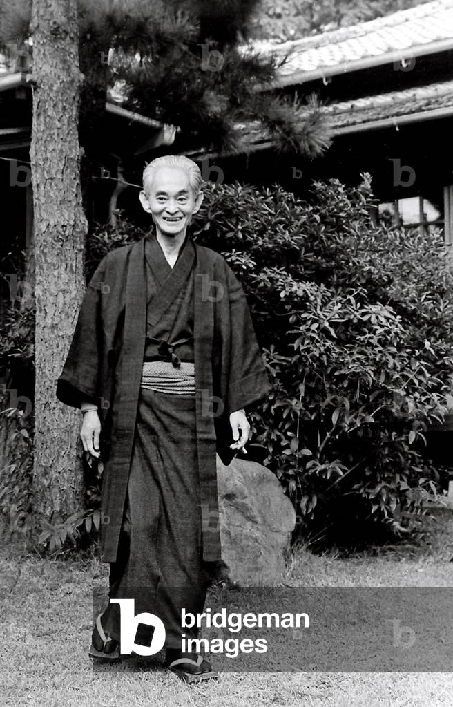 Japan: Yasunari Kawabata (1899 -1972), novelist and essayist, in his garden c. 1968