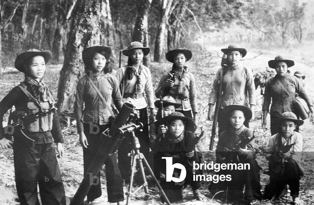 Vietnam: NLF (Viet Cong) female artillery squad, near Cu Chi, 1968
