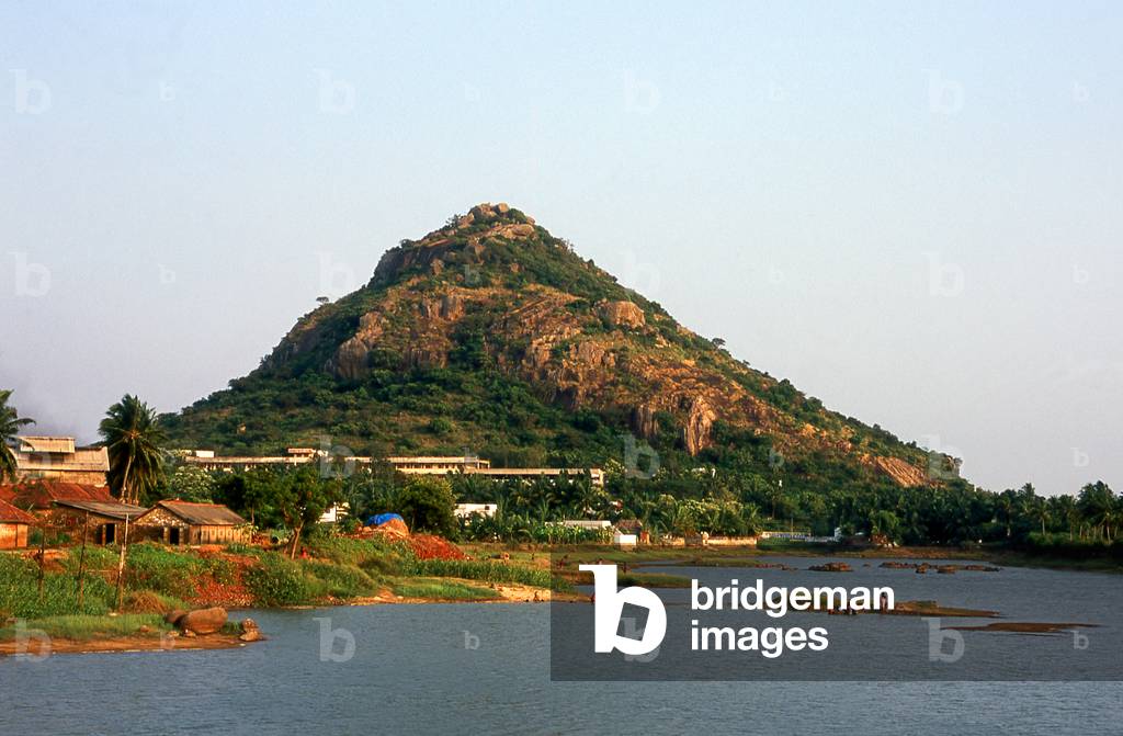 India: Late afternoon and people gather to bathe in a lake at the southern end of the Western Ghats near Nagercoil, Tamil Nadu