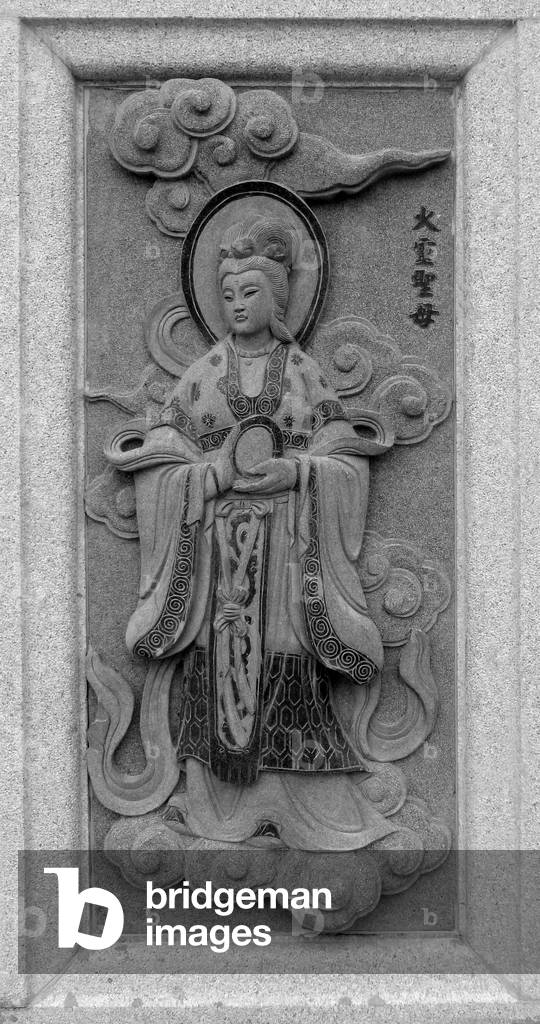 China: Carving of Huoling Shengmu (Mother Fire Spirit), depicting her role in the 16th Century Ming Dynasty novel 