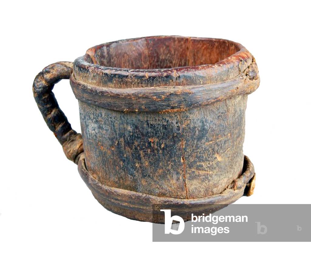 India / Tibet: A wooden and hide grain measure, Ladakh, 19th century