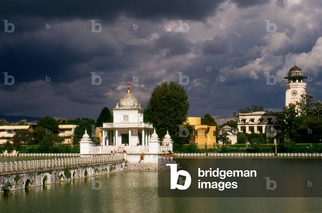 Nepal: Monsoon clouds gather over the Rani Pokhari (Queen's Pond), also known as Nhu Pukhu, with a temple dedicated to Shiva in the centre of the pond, Kathmandu (1996)