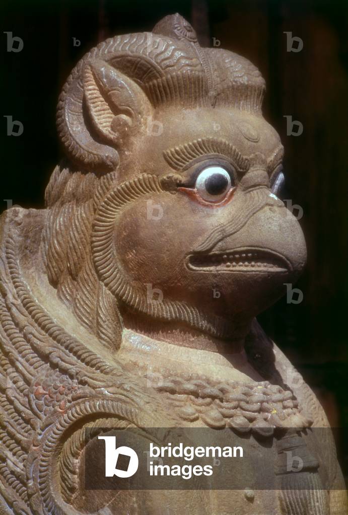 Nepal: Stone griffin guarding the eastern entrance at the Changu Narayan Temple, Kathmandu Valley (photo)