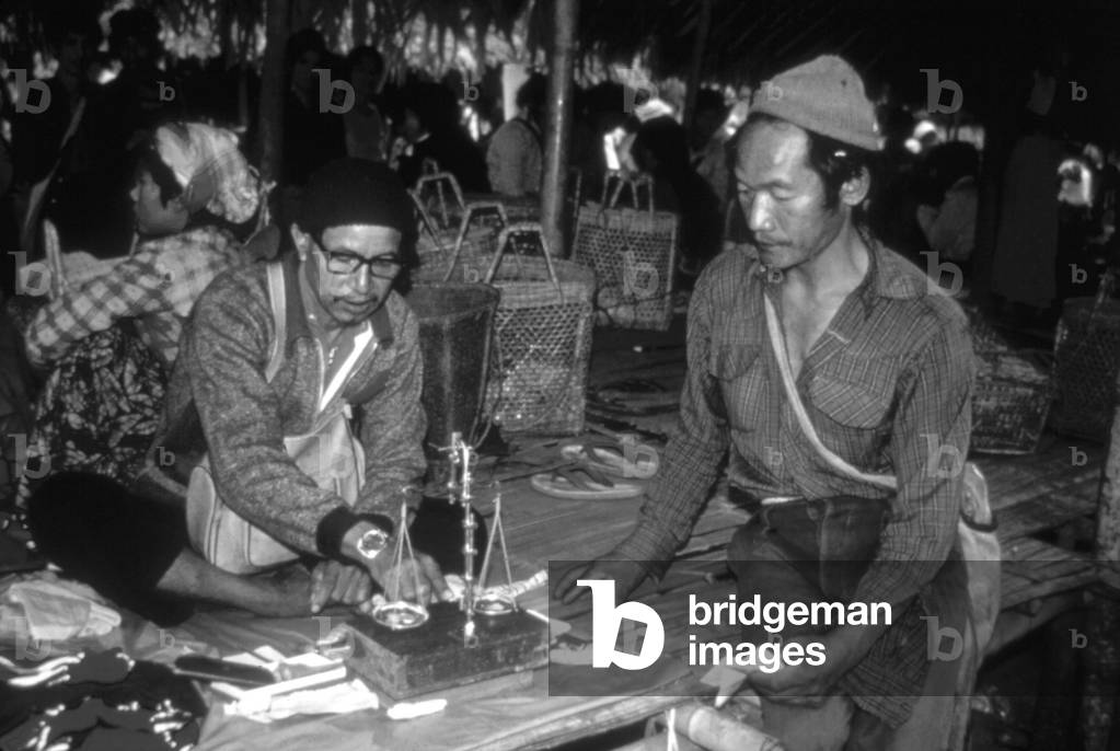 Burma / Myanmar: Kachin gold traders at the Hkal Yang market (c. 1985)