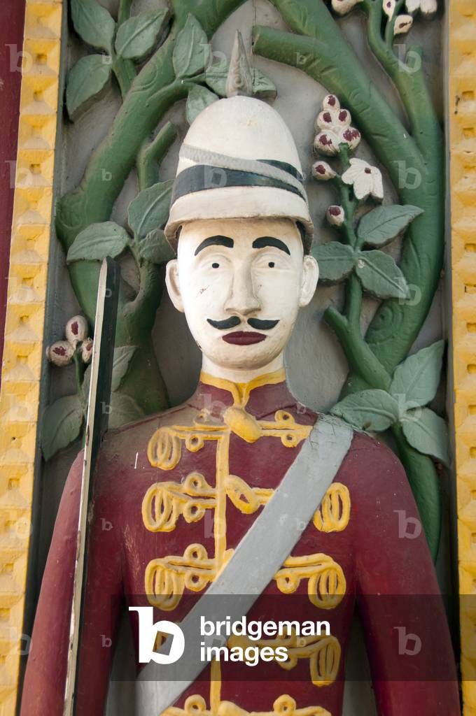 Thailand: Soldier carved on a doorway, Wat Ratchabophit, Bangkok