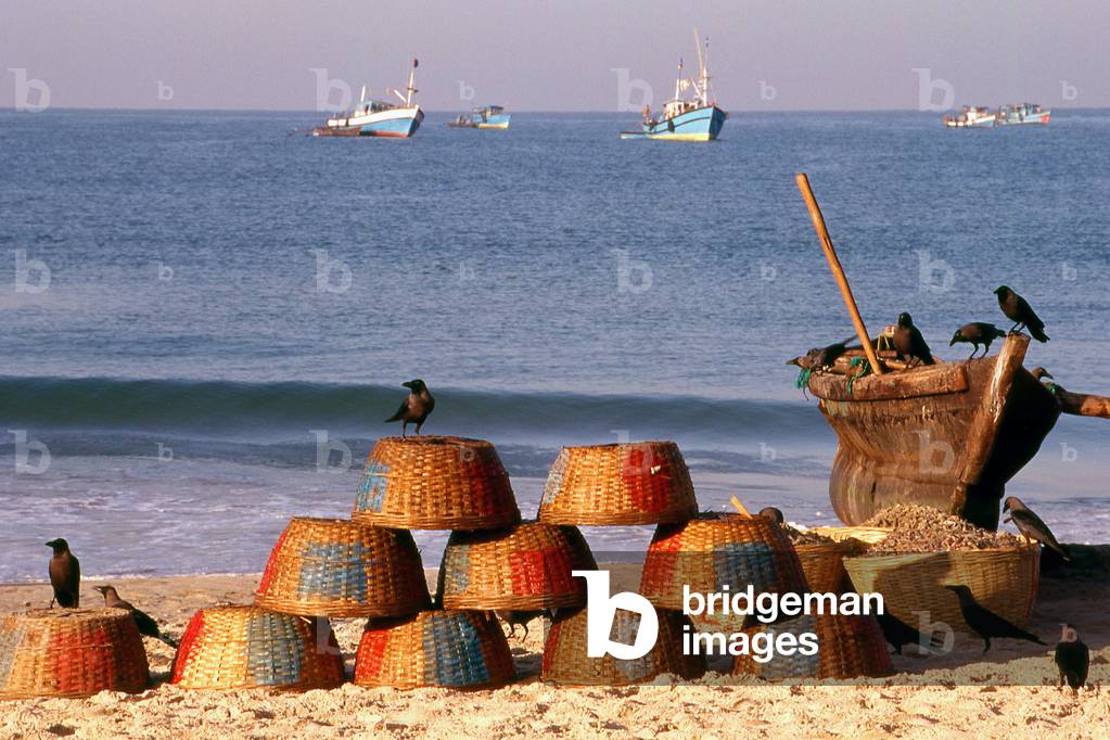 India: Fish baskets belonging to the local fishing community at Colva Beach, Salcete, south Goa