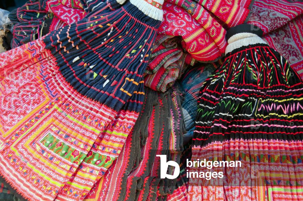 Thailand: Hmong skirts and textiles for sale in a market in Chiang Mai, northern Thailand (photo)