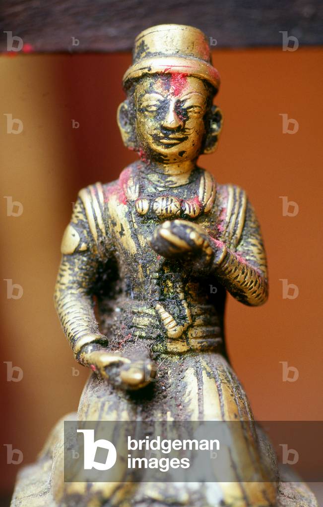 Nepal: Figure of a pious nobleman at the Golden Temple, Patan, Kathmandu Valley (1998)