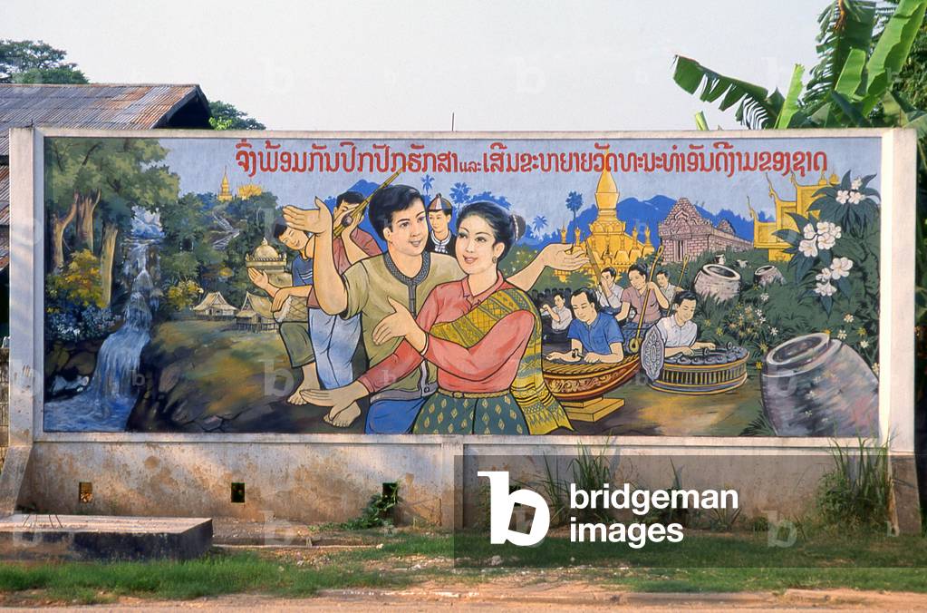 Laos: 'Traditional culture in harmony with Socialist principles', Revolutionary Socialist realist-style political poster on the streets of Vientiane