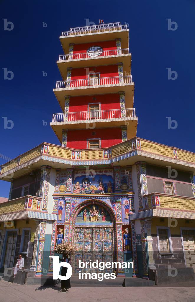 India: A woman stands outside a Hindu temple in Kera, Kutch, Gujarat State