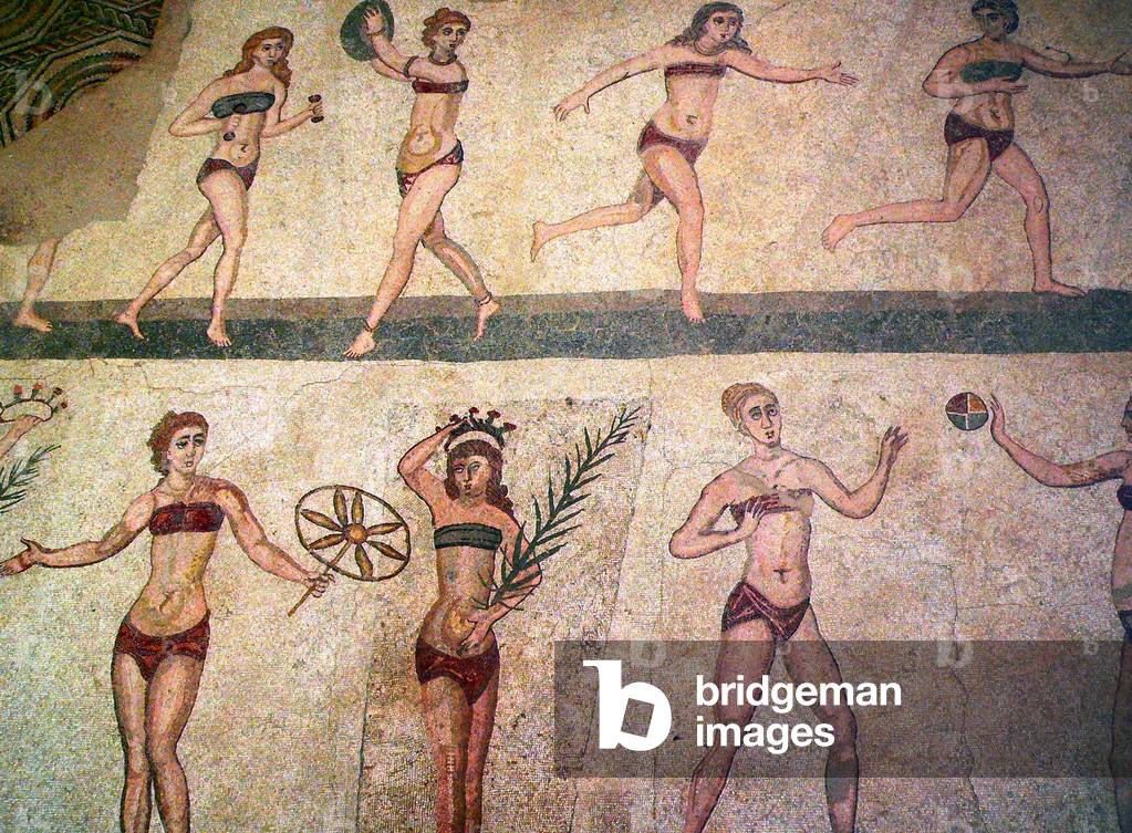 Italy: Roman women playing with a ball in a mosaic at Villa Romana del Casale. One of the so-called 'Bikini Mosaics', 4th century CE