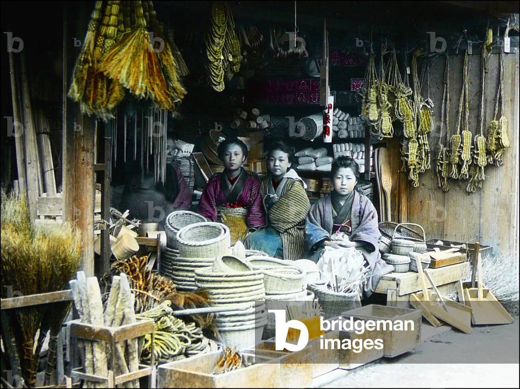 Japan: Three women sitting in a general store, c.1895