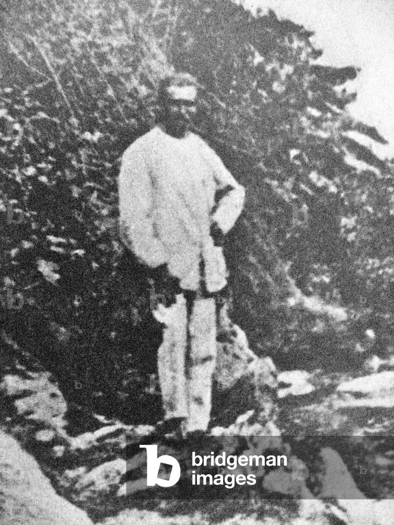 France/Ethiopia: Arthur Rimbaud (1854 - 1891) standing in front of a tree in Harar. Self-portrait, c. 1884