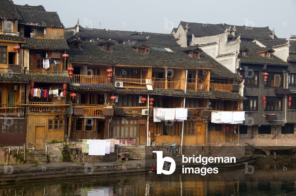 China: Old wooden houses along the banks of the Tuo River, Fenghuang, Hunan Province